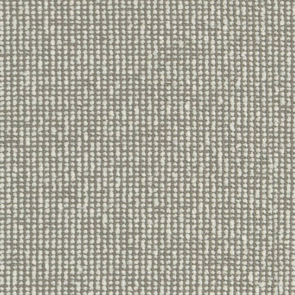 Close-up of neutral beige woven upholstery fabric showing a small-loop textured weave of 100% polyester with light cream dots on a taupe background, suitable for sofas and heavy-duty indoor use.