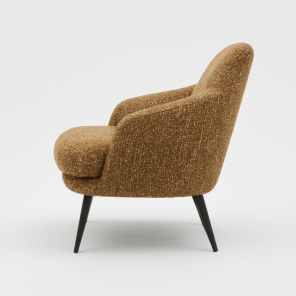 Side profile of a modern brown fabric accent chair with a curved back, integrated arms, plush seat cushion and tapered black legs, photographed against a plain white background.