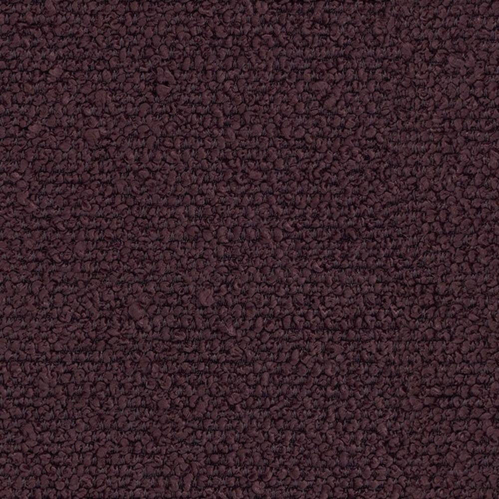 Close-up of dark plum 100% polyester bouclé upholstery fabric showing dense looped texture, ideal for sofas and indoor upholstery.