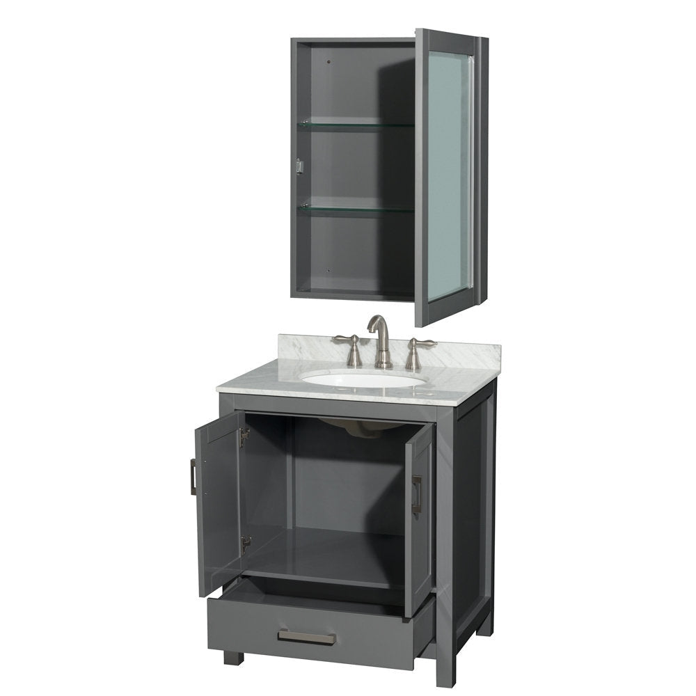 Freestanding modern gray solid-wood bathroom vanity with white stone countertop and undermount ceramic sink, brushed nickel faucet, open cabinet doors and drawer, plus matching wall-mounted medicine cabinet with glass shelves.
