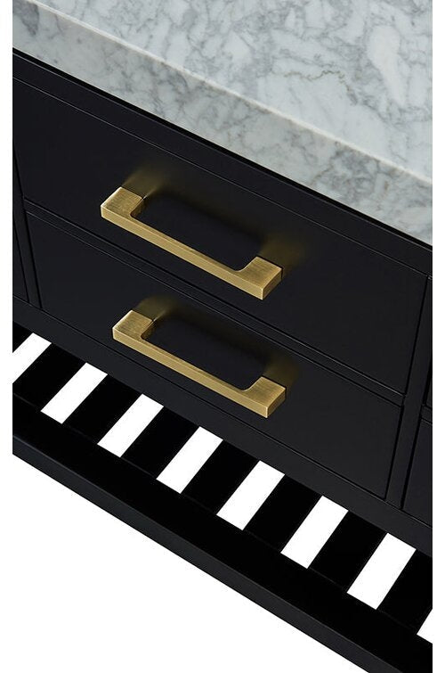Close-up of a modern black solid wood vanity showing a white stone countertop, two drawers with brushed-gold rectangular pulls, and an open slatted bottom shelf.