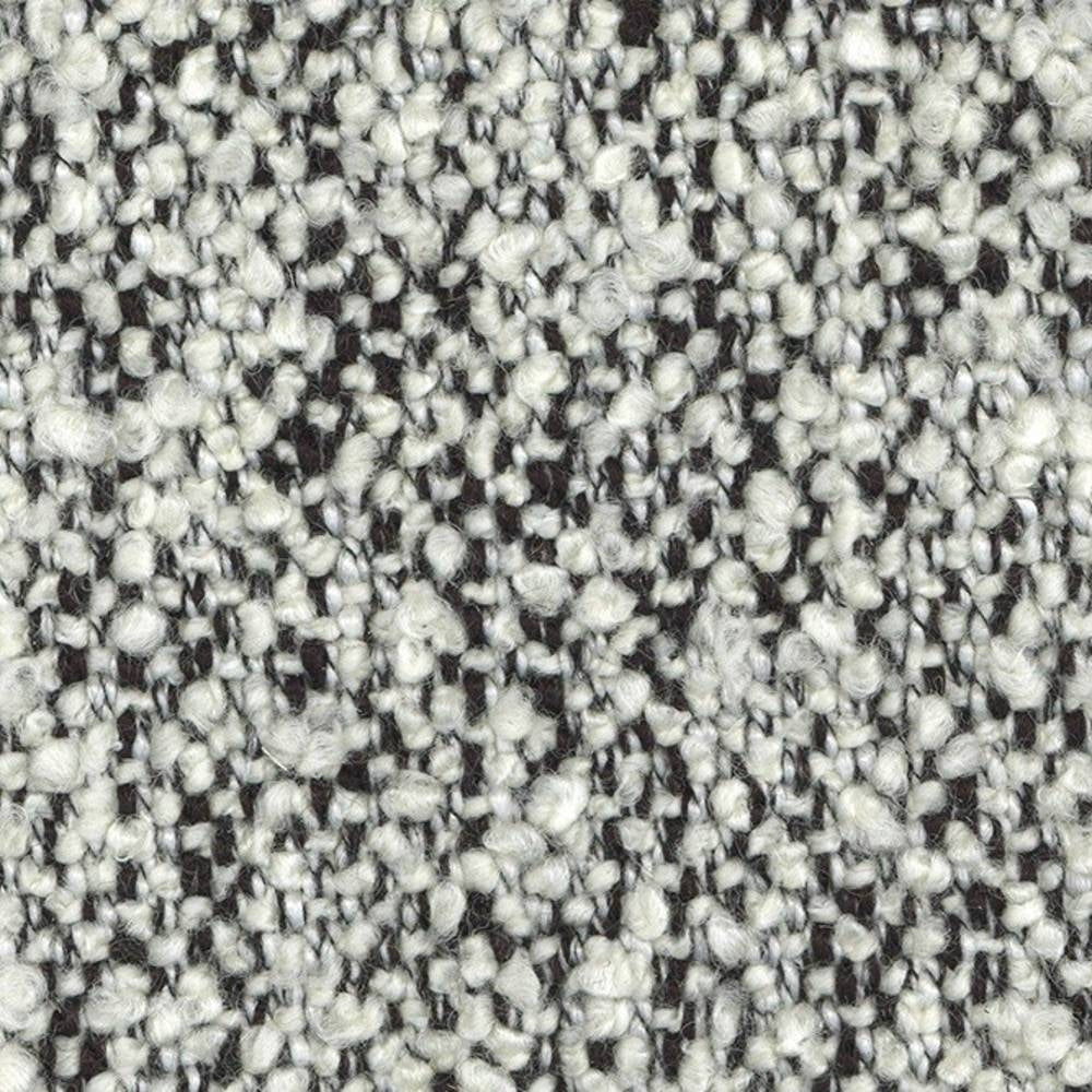 Close-up of off-white boucle wool-blend upholstery fabric with looped texture and dark-gray flecks, showing the woven construction ideal for contemporary sofa upholstery.