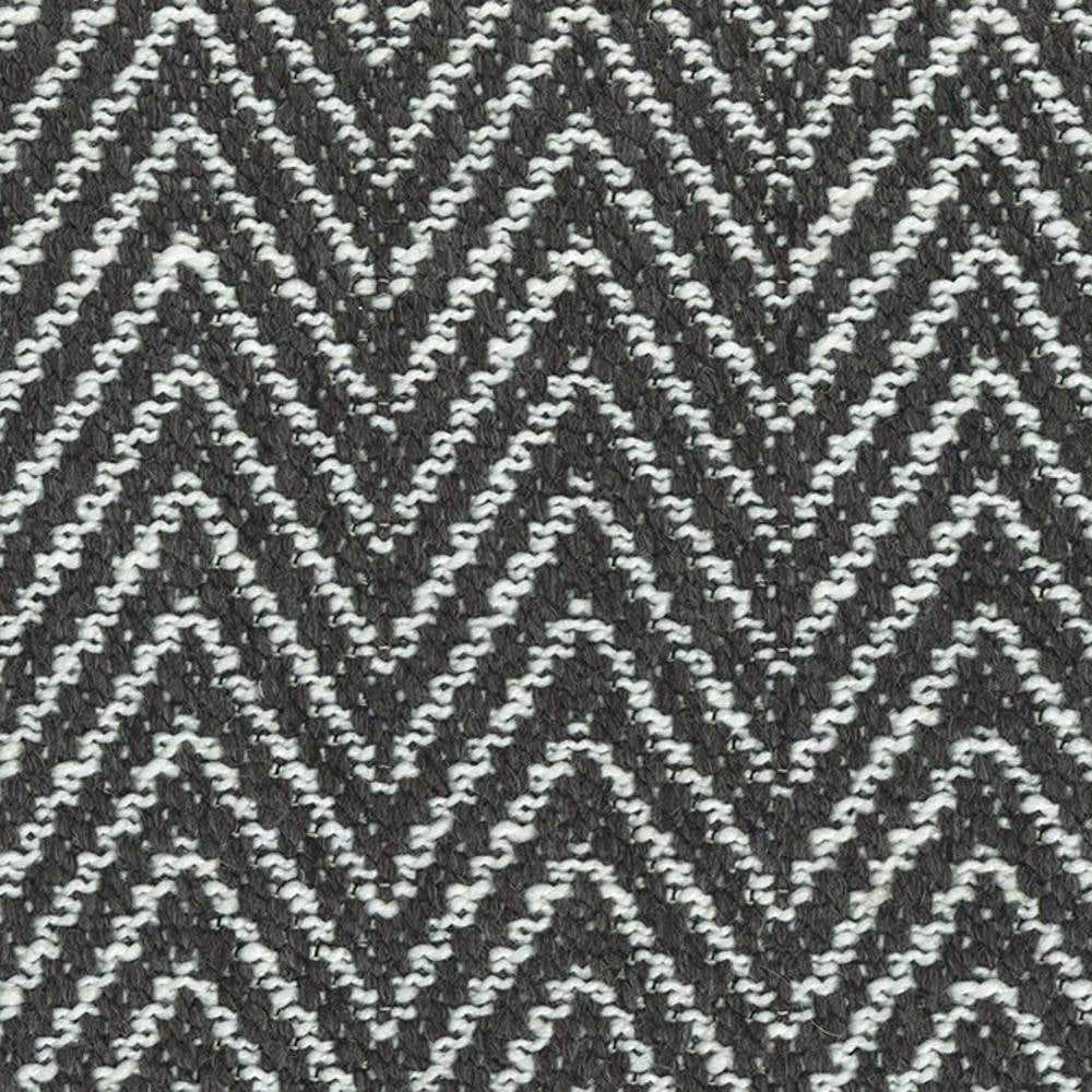 Close-up of gray and white chevron-pattern woven upholstery fabric in a 20% wool, 69% acrylic, 11% polyester blend with a textured knit look, ideal for contemporary sofa upholstery.
