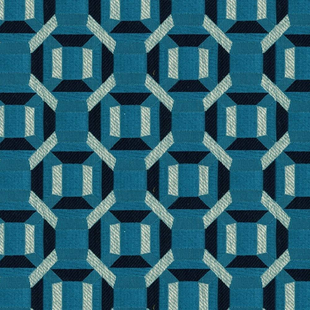 Close-up of woven 100% polyester upholstery fabric in teal and navy with a repeating geometric octagon-and-square motif and light aqua chevron accents, a contemporary modern pattern for sofas.