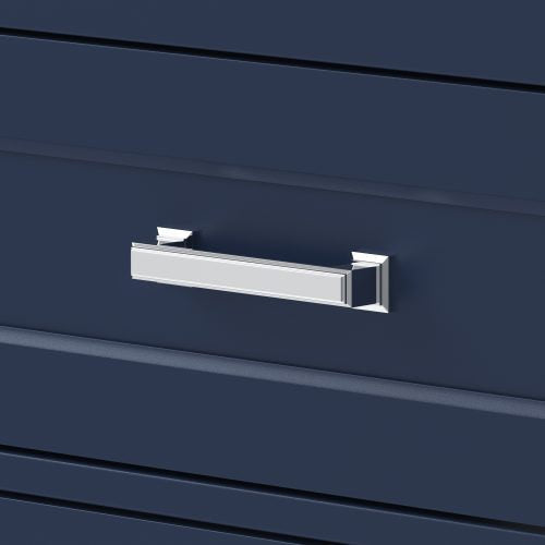 Close-up of a polished chrome rectangular drawer handle mounted on a stone-colored solid wood modern vanity drawer with horizontal recessed paneling.