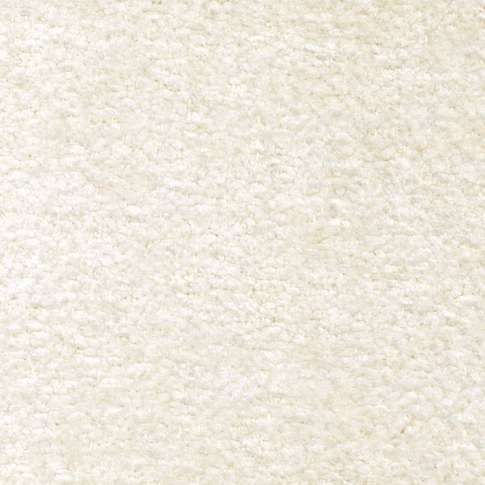 Close-up of cream boucle upholstery fabric showing soft, nubby texture; 87% polyester with 6% linen and 7% rayon, suitable for indoor sofa upholstery.