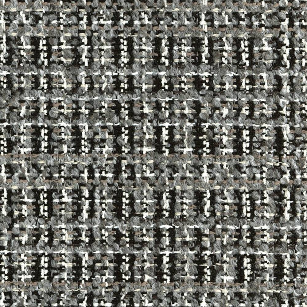 Close-up of gray, white and black boucle upholstery fabric showing looped woven texture in a subtle grid pattern; 14% acrylic, 12% viscose, 74% polyester.