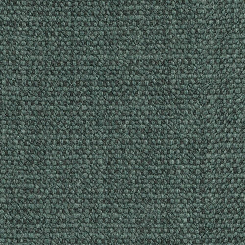 Close-up of teal-green looped upholstery fabric with a tight woven texture, a durable 18% wool / 67% acrylic / 15% polyester blend designed for modern indoor sofa upholstery.